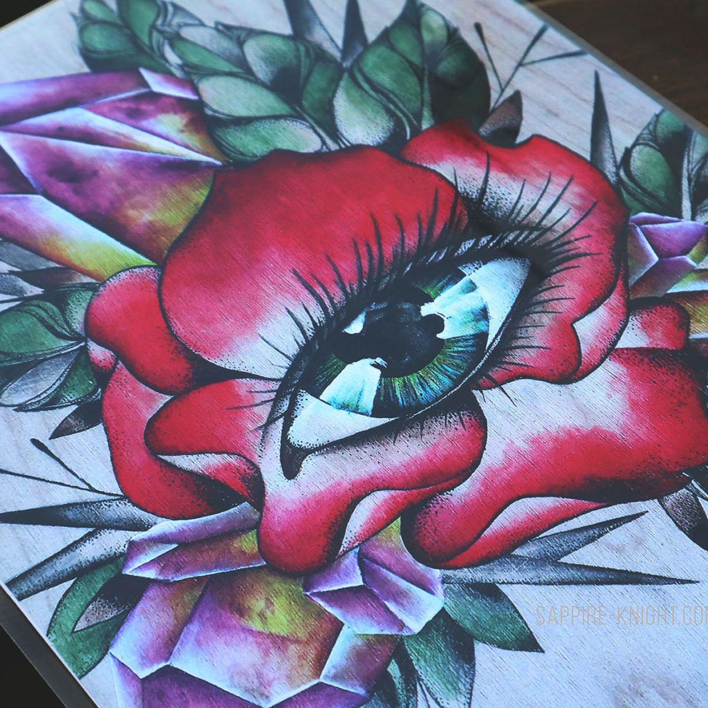 Eye inside a blooming red rose, in front of crystals, leaves and thorns.